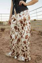 Load image into Gallery viewer, Cow Print Satin Pants

