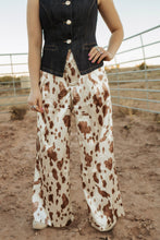 Load image into Gallery viewer, Cow Print Satin Pants
